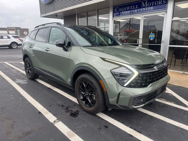 2024 Kia Sportage X-Pro Prestige in Jungle Green/Ebony Black Roof — front three-quarter view